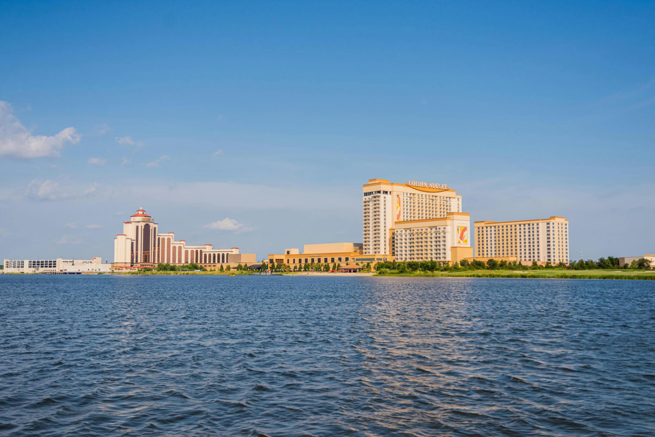 Golden Nugget and L’Auberge casino resorts across the waterfront in Lake Charles, Louisiana.